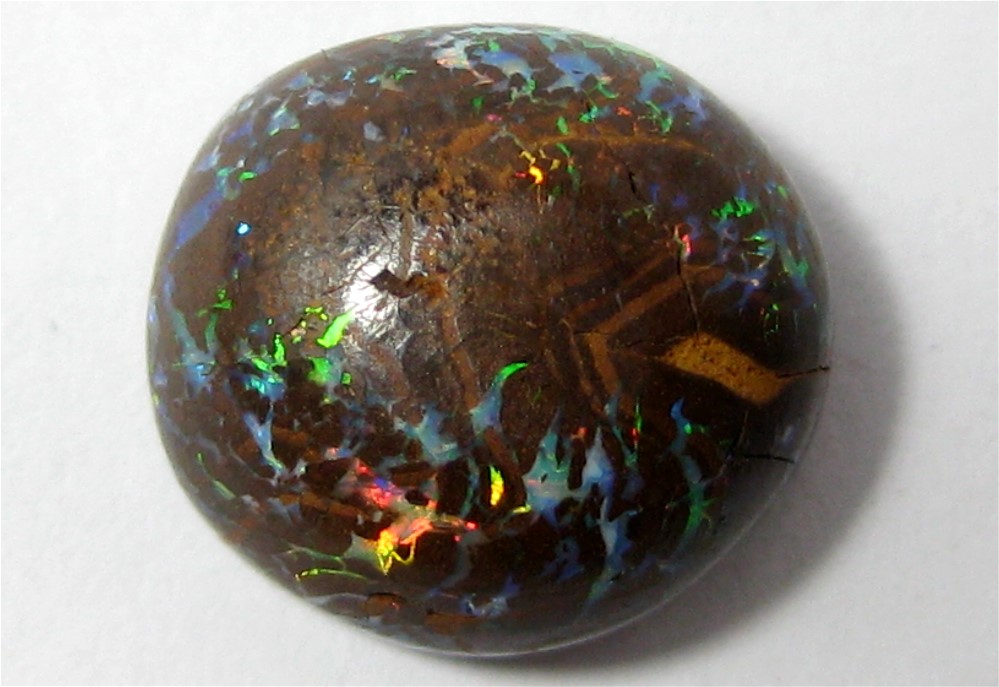Natural Australian Boulder Opal freeform cabochon.....41x13x6mm....32CTS....B#2553
